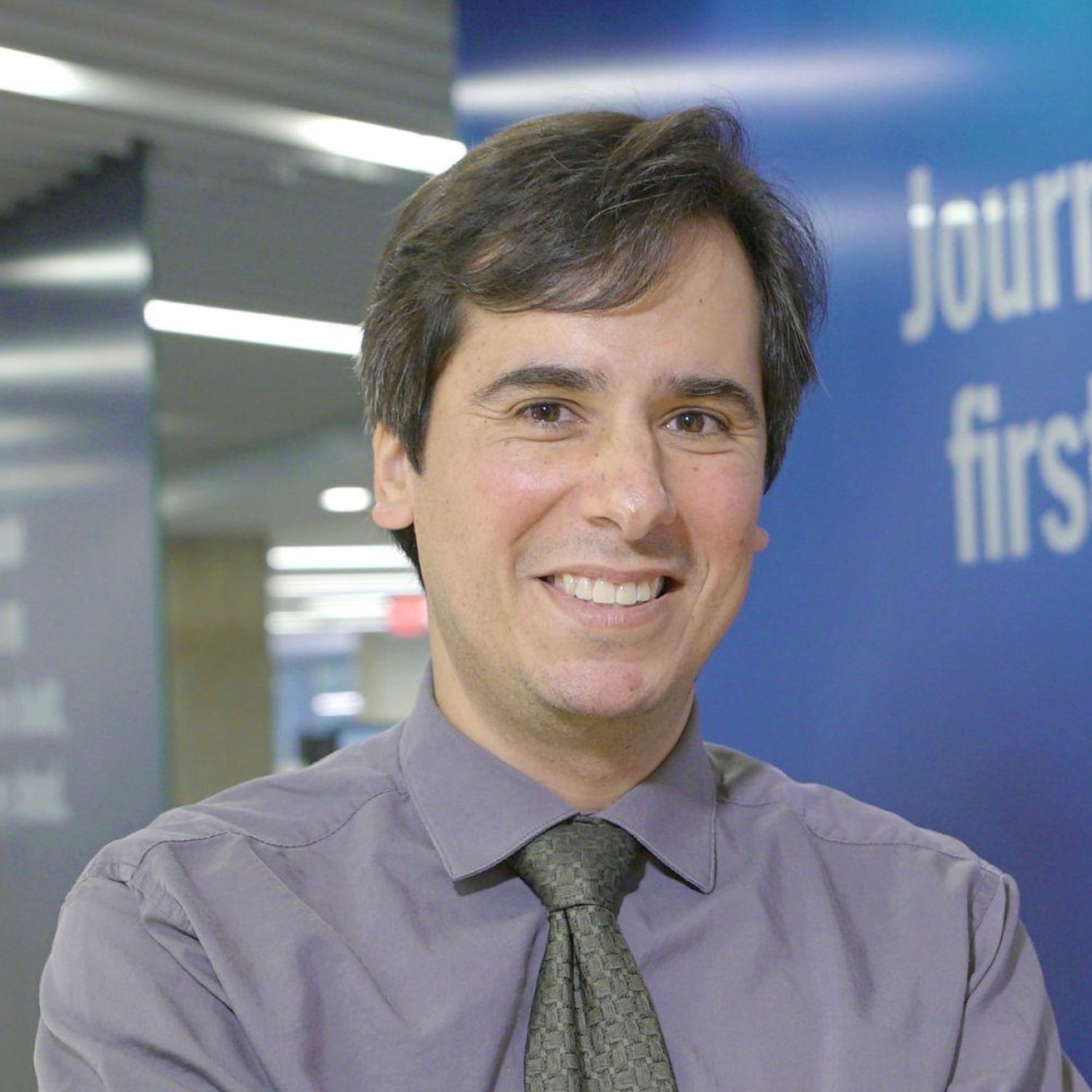 Carlos Lozada headshot